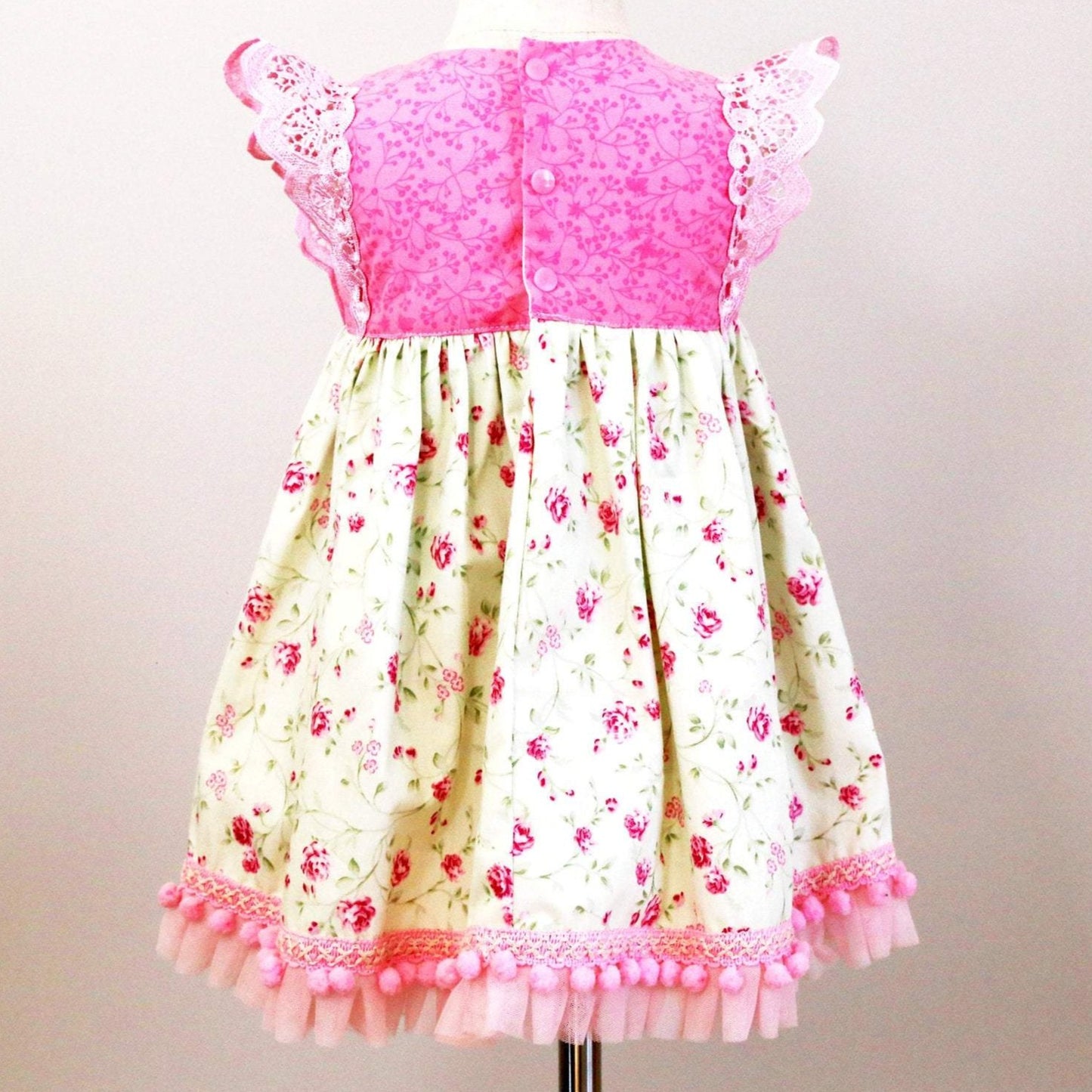 Dress - Maddie - Pink Bodice, Pink Roses on Pale Mint Green Skirt with Light Pink Lace Flutters and Lace/Pom Pom Hemline
