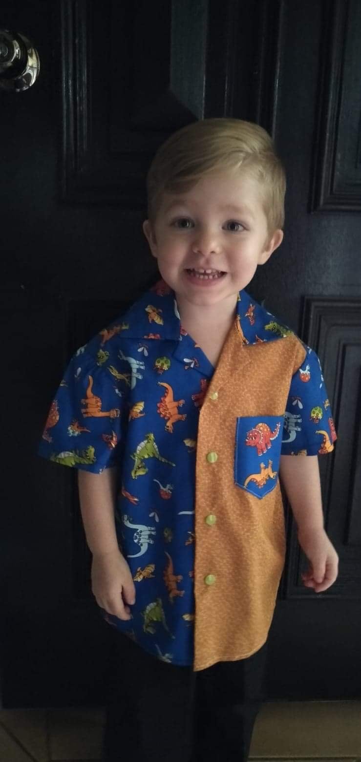 Shirt - Cartoon Dinosaurs on Blue Background with Mustard Contrasting Front Panel